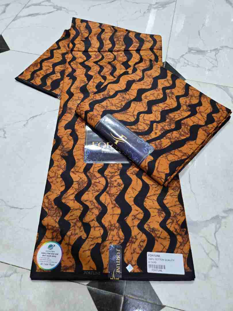 Fortune Collection burnt orange and black wavy stripe tiger pattern Ankara fabric, 100% cotton premium African wax print